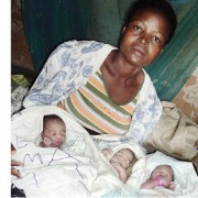 Nakaibale with her triplets at home in Bukwaya-Inuula, Bugyenda district