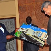 State minister for Primary Health Care Sarah Opendi hands over the artistic impression of the proposed hospital to Islamic Development Bank Engineer Zohair Kashgary, January 9th Jan 2013. PHOTO/Maria Wamala