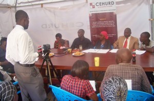 Mr. Mubangizi Micheal and Musimenta Jennifer (holding baby) during a press conference